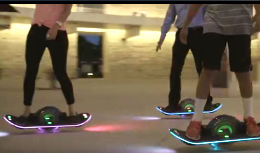 Three-people-riding-the-Hoverboard-together