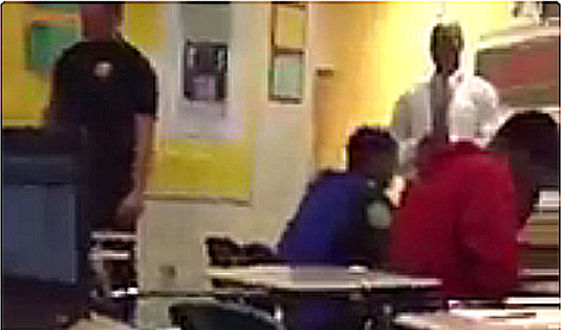 School-administrator-wathcing-the-student-assault-at-Spring-Valley-High