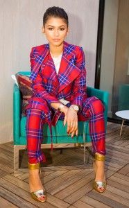 Zendaya-Coleman-in-a-red-and-blue-plaid-pants-suit.