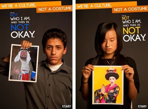 Two-students-hold-up-cultural-costumes. They-make-a-point-to-end-stereotyping